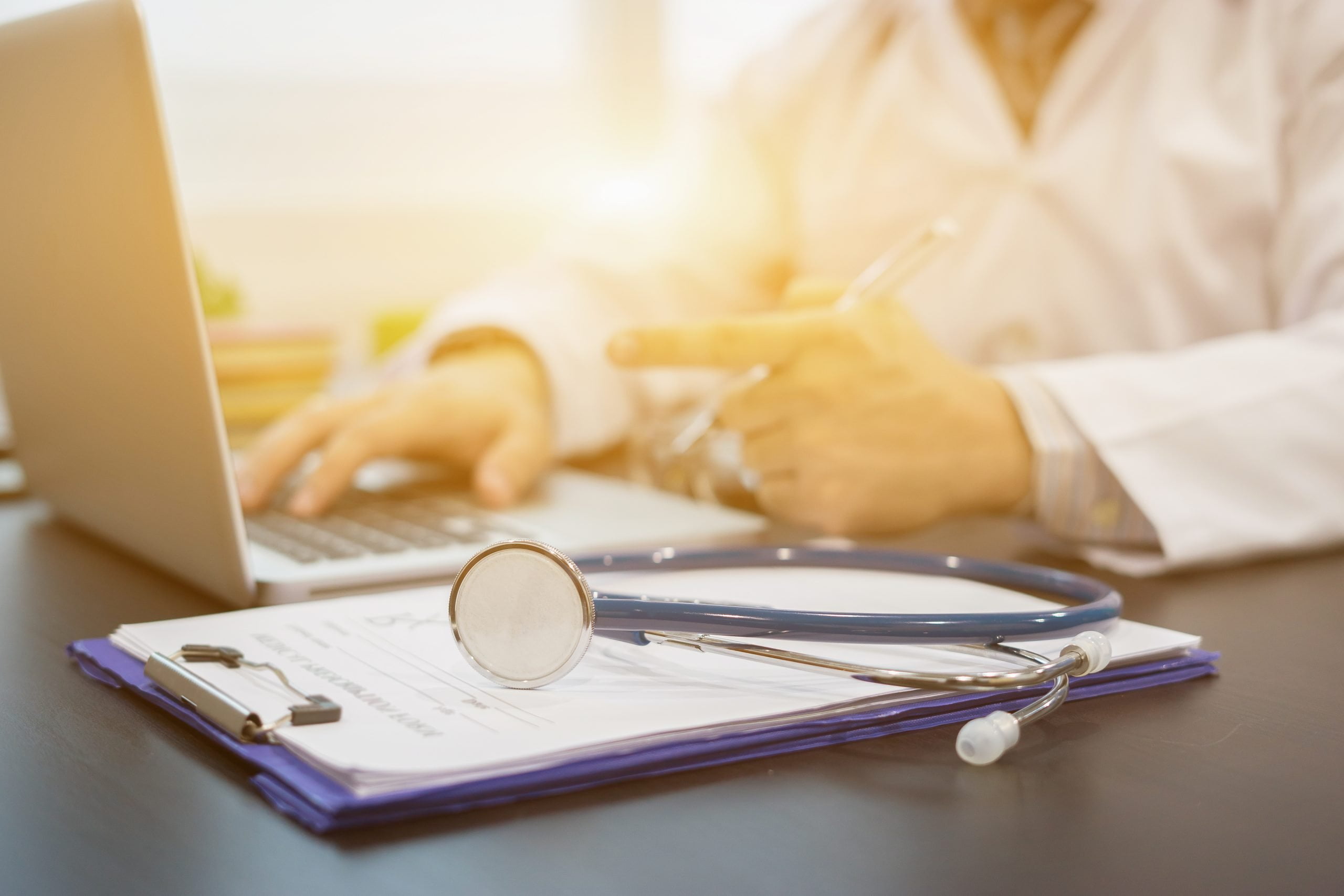 Stethoscope,On,A,Prescription,Clipboard,And,Laptop,On,Desk,doctor,Working Stethoscope,On,A,Prescription,Clipboard,And,Laptop,On,Desk,doctor,Working